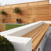 A contemporary garden seating arrangement that matches our fencing.