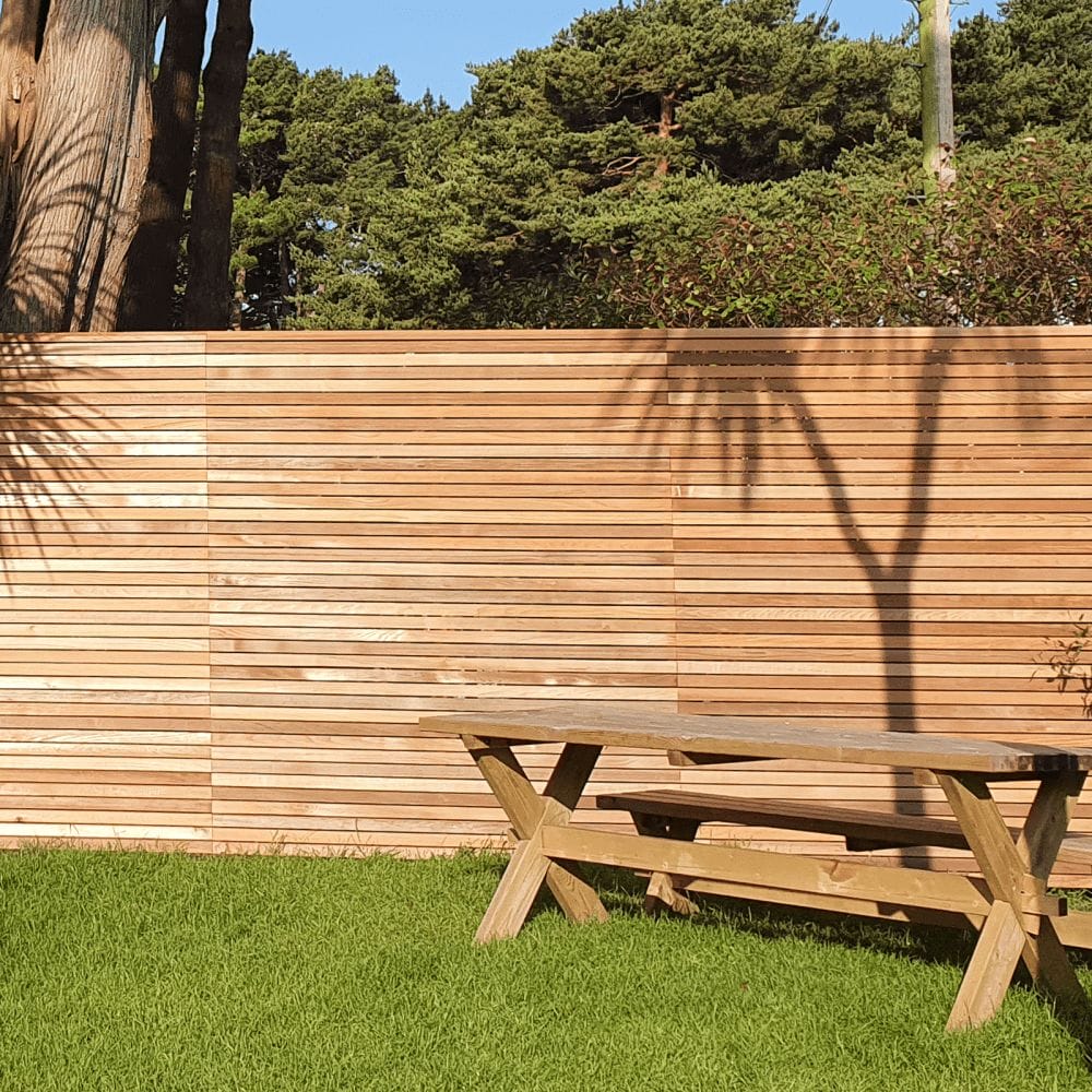 Cedar fence with garden bench