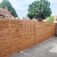 A veil Redwood Fence panel. Budget slatted fencing panel available at a great price.