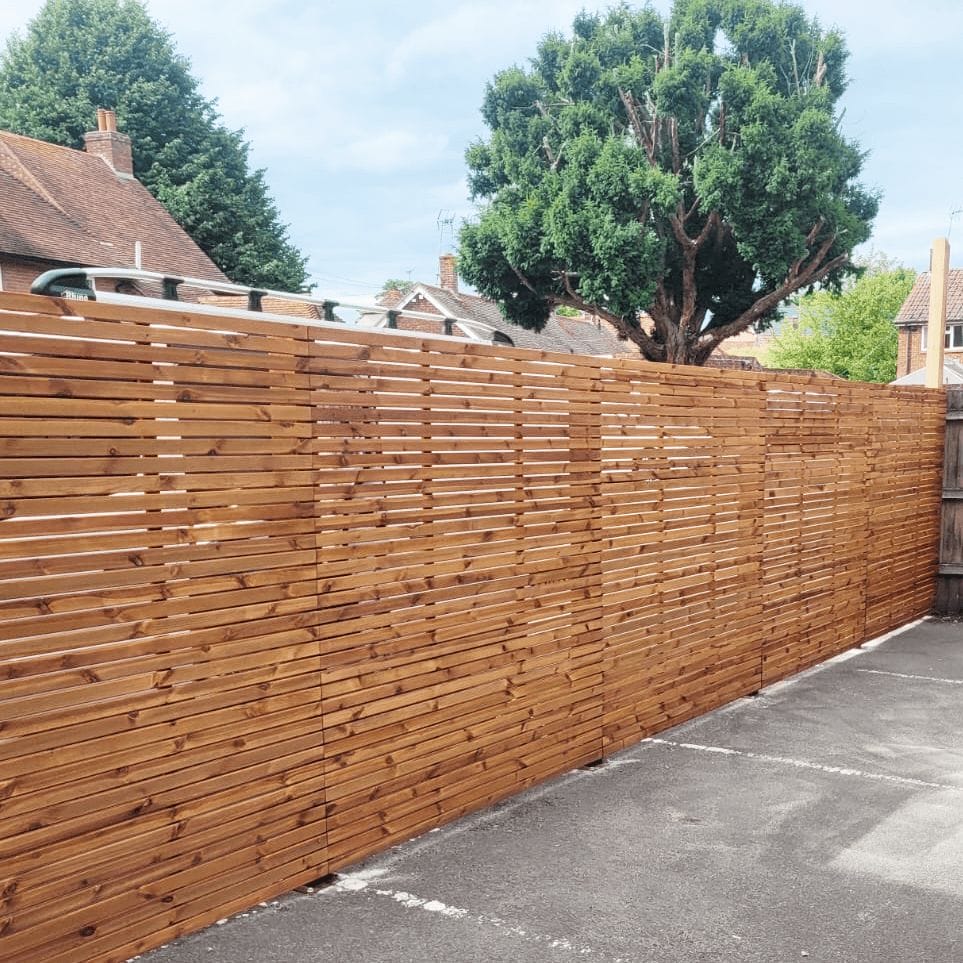 A veil Redwood Fence panel. Budget slatted fencing panel available at a great price.