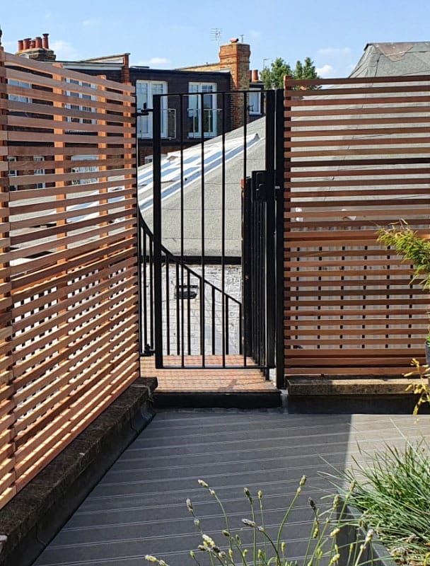 garden joinery at its finest. this modern fence was created in the contemporary fencing workshop